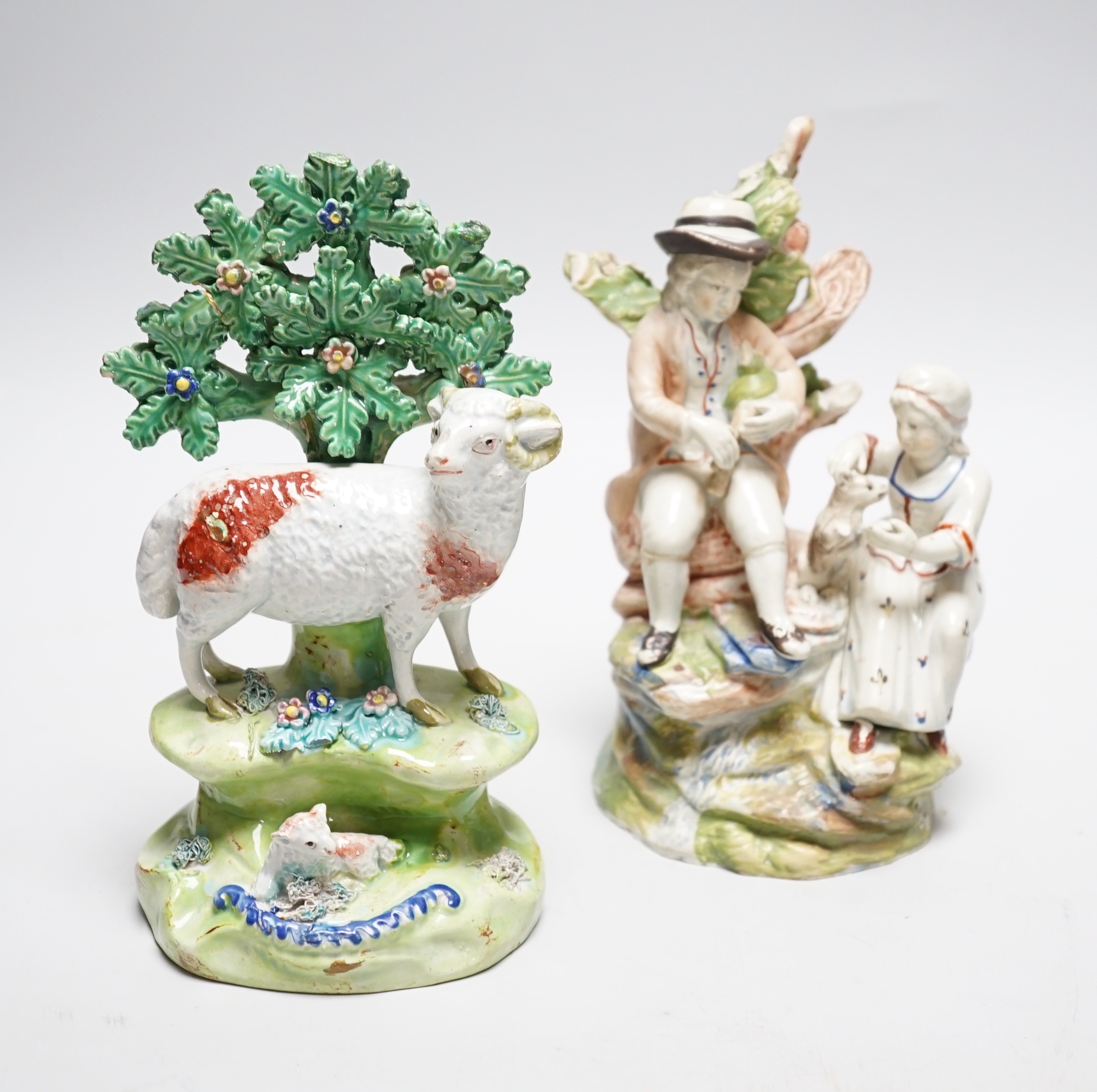 A Walton pearlware figure of a ram, c.1820 and an Enoch Wood type figure group, c. 1800, tallest 19cm